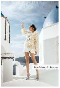 aBitze Fotoartist - Angela M. Schlabitz - Elysian Breeze SS23 Campaign for ANY DI Munich. Santorini is truly a magical place. The pristine white buildings and stunning sunsets make for an incredible sight. Soft hues of light add to the unmatched beauty of