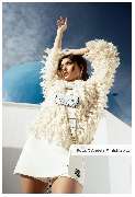 aBitze Fotoartist - Angela M. Schlabitz - Elysian Breeze SS23 Campaign for ANY DI Munich. Santorini is truly a magical place. The pristine white buildings and stunning sunsets make for an incredible sight. Soft hues of light add to the unmatched beauty of