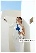 aBitze Fotoartist - Angela M. Schlabitz - Elysian Breeze SS23 Campaign for ANY DI Munich. Santorini is truly a magical place. The pristine white buildings and stunning sunsets make for an incredible sight. Soft hues of light add to the unmatched beauty of