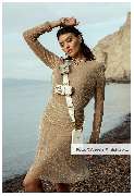aBitze Fotoartist - Angela M. Schlabitz - Elysian Breeze SS23 Campaign for ANY DI Munich. Santorini is truly a magical place. The pristine white buildings and stunning sunsets make for an incredible sight. Soft hues of light add to the unmatched beauty of