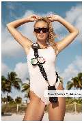 aBitze Fotoartist - Angela M. Schlabitz - Miami Vibes SS22 Campaign for ANY DI Munich. Visiting Miami Beach is like stepping into a fashionista's dreamscape. Palm trees swaying in the sea breeze, white sand beaches radiating a warm glow, and vintage cars 