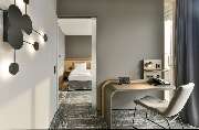 Best Western Plus Hotel Papenburg - Superior Suite - living room and work space