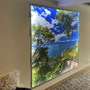 DeSoTec Schwerin GmbH - Fotosegment an der Wandseite - Meeresblick m. Steilufer+Bäumen.jpg