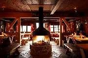 Elmauer Alm - Kaminfeuer in der Elmauer Alm