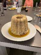 Geschlossene Gesellschaft - Geschlossene Gesellschaft Traditionelles Schmorgericht in Gugelhupf-Form, serviert als Highlight des Abends bei Geschlossene Gesellschaft von Wulf Mey.