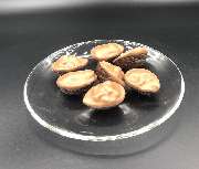 Geschmacksache by silke - Walnuss auf Weinbrand Marzipan und mit Vollmilchschokolade bedeckt