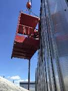 Glaserei Schaubeck GmbH | Fensterinstallation | München - Fassadenverglasung mit Kran -  Glas im Außenbereich - Glaserei Schaubeck GmbH München