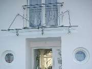 Glaserei Schaubeck GmbH | Fensterinstallation | München - Glasvordach Eingangstür -  Glas im Außenbereich - Glaserei Schaubeck GmbH München