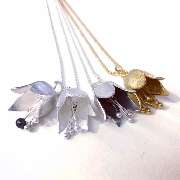 Anhänger in Silber und vergoldet mit Perle