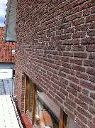 Heinrich Feldmann GmbH - Optische Angleichung neu eingesetzter Klinkersteine in einer alten Fassade