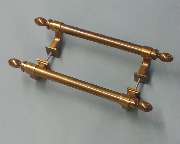 JOHO GmbH - Beispiel  Metallteile für den Ladenbau
hier  