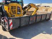 Jütte GmbH - Bagger- und Fuhrbetrieb - Baggertransport im Container.jpg