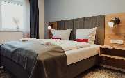 Küsten Apartments - Schlafzimmer Ferienwohnung in Hooksiel