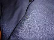 Kunststopferei Hiltmann - Kunststopfen und Reparatur von Strickkleidung und Businesskleidung - Anzugjacke mit Mottenfraß Rücken