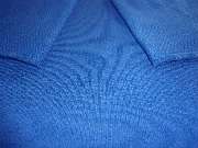 Kunststopferei Hiltmann - Kunststopfen und Reparatur von Strickkleidung und Businesskleidung - Pullover Mottenloch nachher