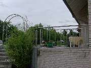 Marko Battefeld Metallbau - Terasse mit Rosenbogen Sonderanfertigung