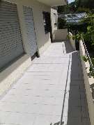 Minerva UG - Balkon mit Fliesen