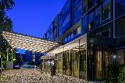Pullman Munich - Haupteingang bei Nacht