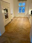 Raumkultur GmbH - Fischgrät Küche.jpg