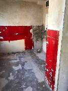 Renovierung E. Dilek - Sanierung einer 2-Zimmer Wohnung in Stuttgart mit Blick auf den Küchenbereich. Die Wohnung musste vor der Sanierung komplett entkernt werden.