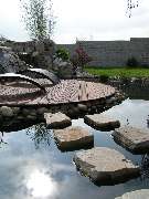 RMG Rhein-Main-Gruen GmbH Garten- und Landschaftsbau - Koiteich mit Trittsteinen