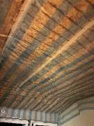 Tischlerei Hennemann - Tischlerei Hennemann sauber installierte Dämmung mit Dampfsperrfolie an einer Zimmerdecke. Optimal zur Demonstration fachgerechter Innenausbauarbeiten, Wärmedämmung und Feuchtigkeitsschutz.