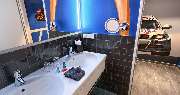 V8 Hotel Motorworld Region Stuttgart, BW Premier Collection by Best Western - Themeroom LIQUI MOLY Bathroom