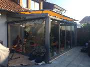 Vordermayer Wohnen mit Glas GmbH - Terrassenüberdachung mit Schiebetüren und Dachbeschattung